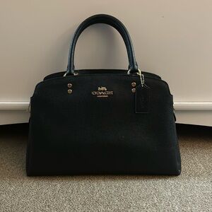 Black medium sized Coach shoulder bag